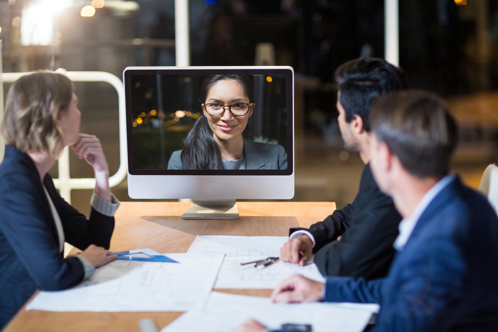 Business team having virtual conference in the meeting room